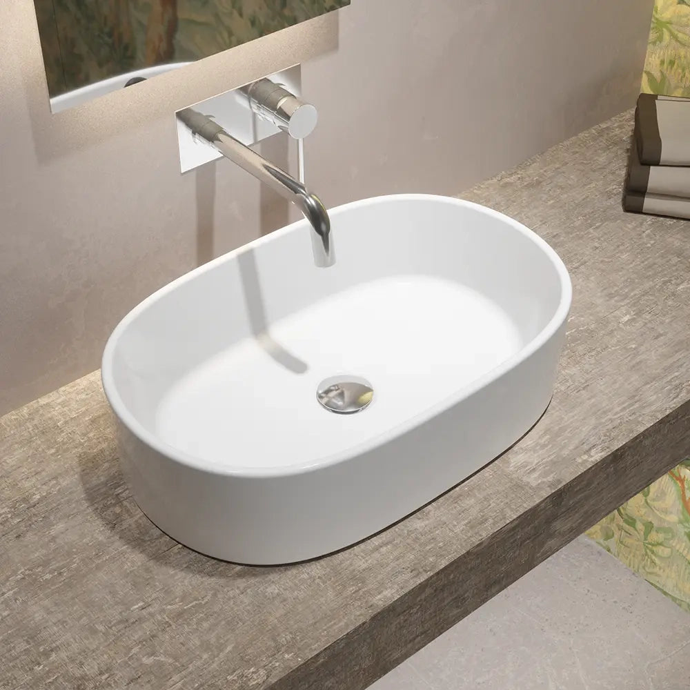 Lavabo da appoggio ovale 55,5/56,5x36,5x15 cm Bianco