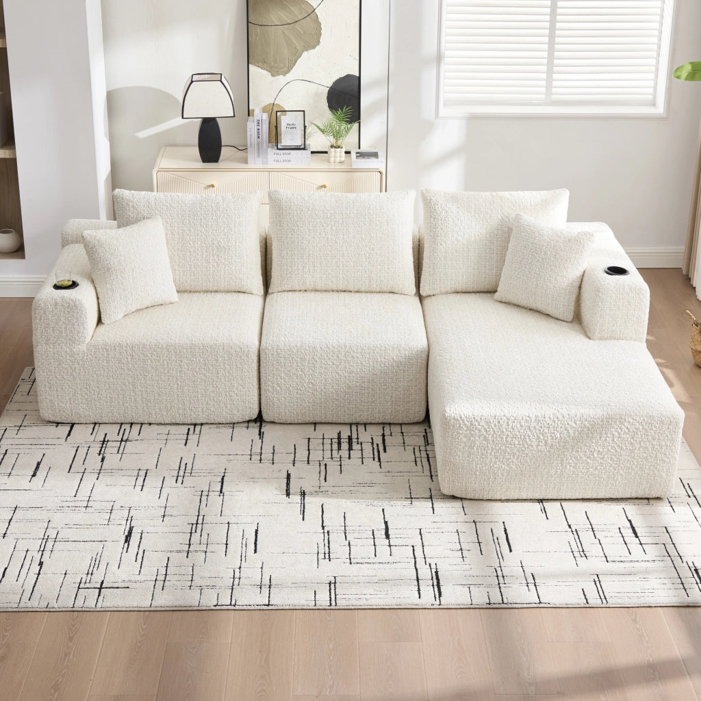Divano modulare angolare 3 posti con braccioli larghi e tasche laterali in chenille beige