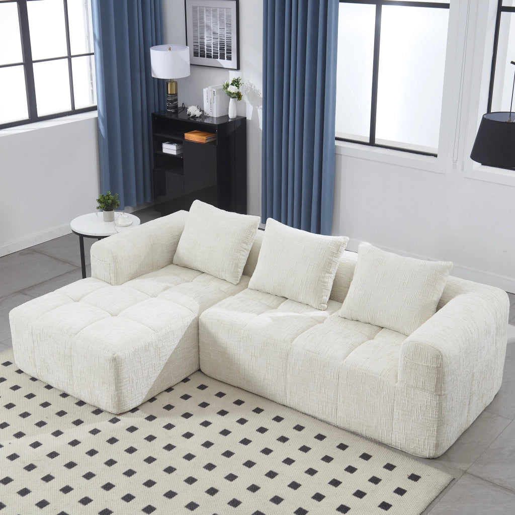 Divano modulare a L in chenille beige con chaise longue, 3 cuscini e tasche laterali