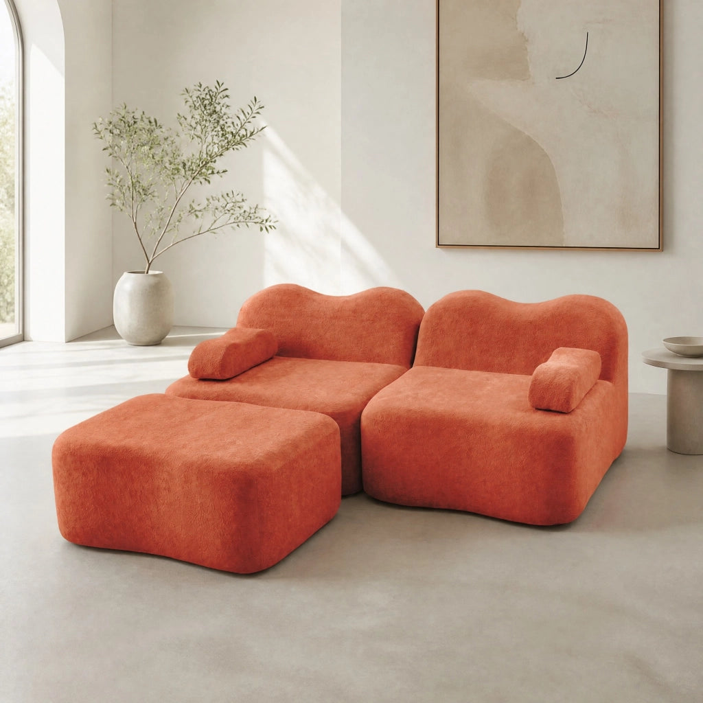 Divano modulare angolare 2 posti con pouf; forma ondulata e cuscino bracciolo mobile; velluto arancione