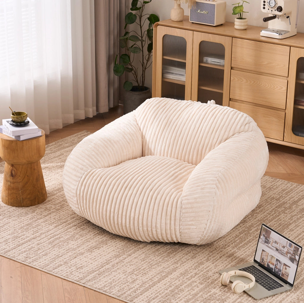 Poltrona sacco in velluto a coste beige con schienale