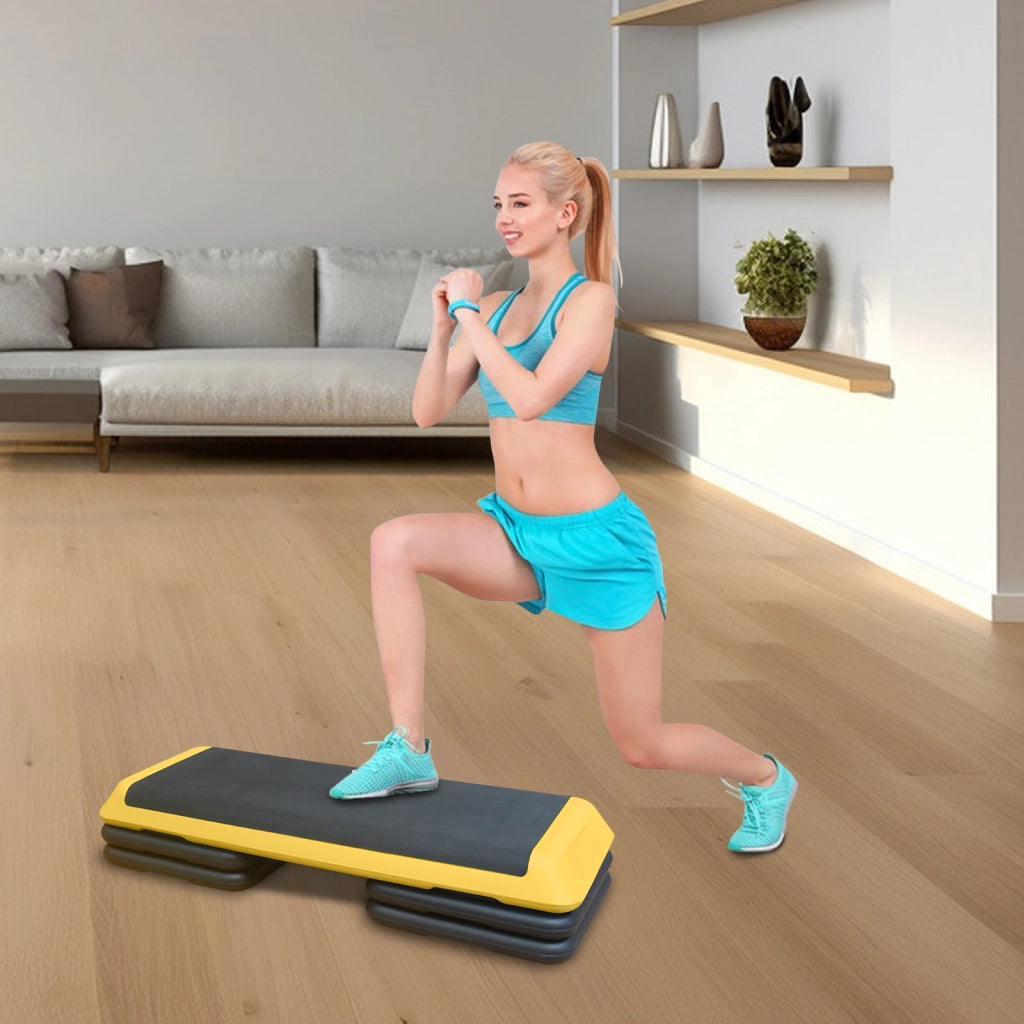 Piattaforma step aerobica ¨C Minimal ¨C 110cm, altezza regolabile, 4 supporti, gialla