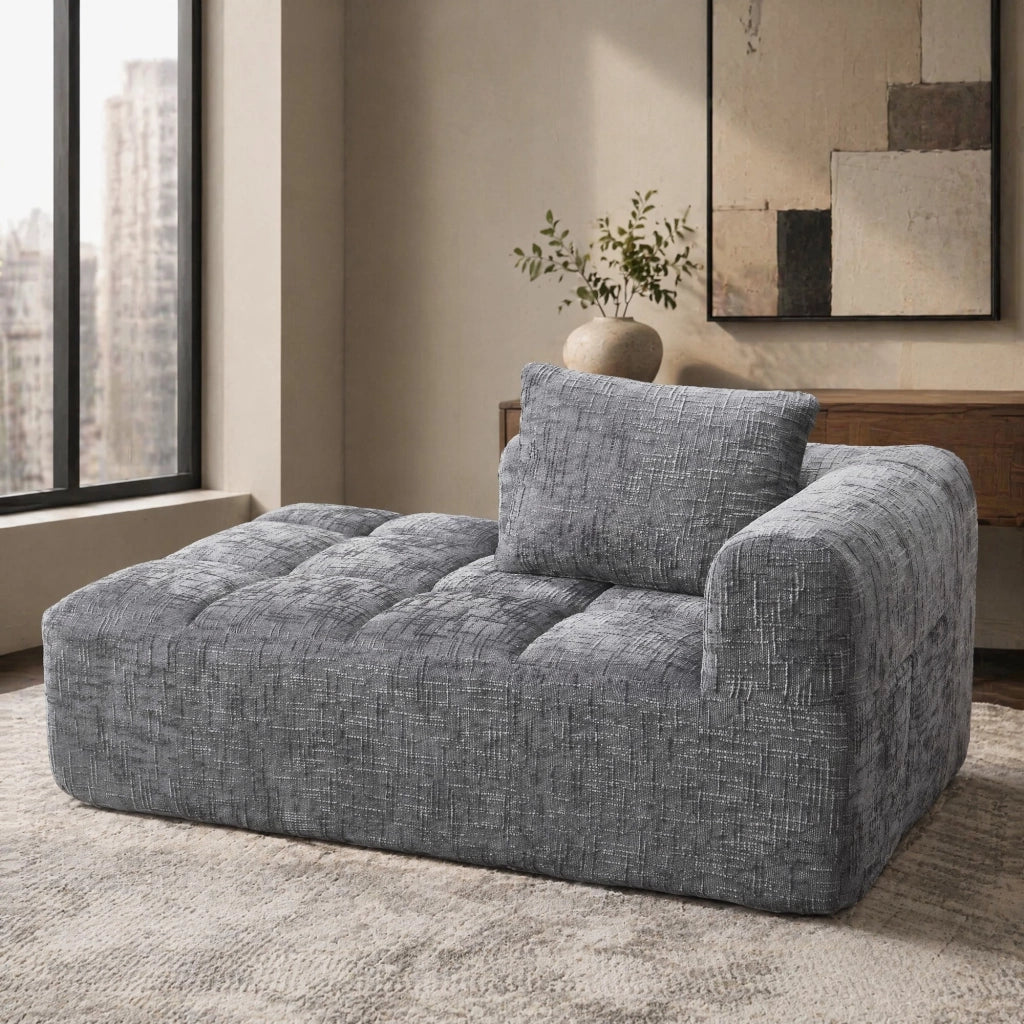 Divano chaise longue in chenille grigio con tasche laterali e cuscino