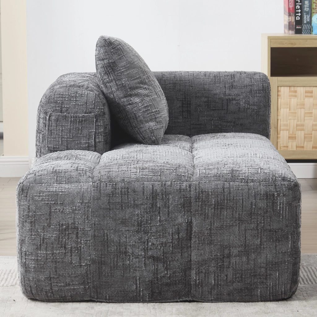 Divano chaise longue in chenille grigio con tasche laterali e cuscino