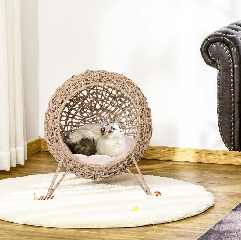 Cuccia per gatti ULEVR in PE rattan con cuscino, struttura rialzata, marrone, 54x46x59 cm