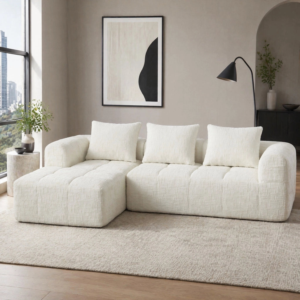 Divano modulare a L in chenille beige con chaise longue, 3 cuscini e tasche laterali