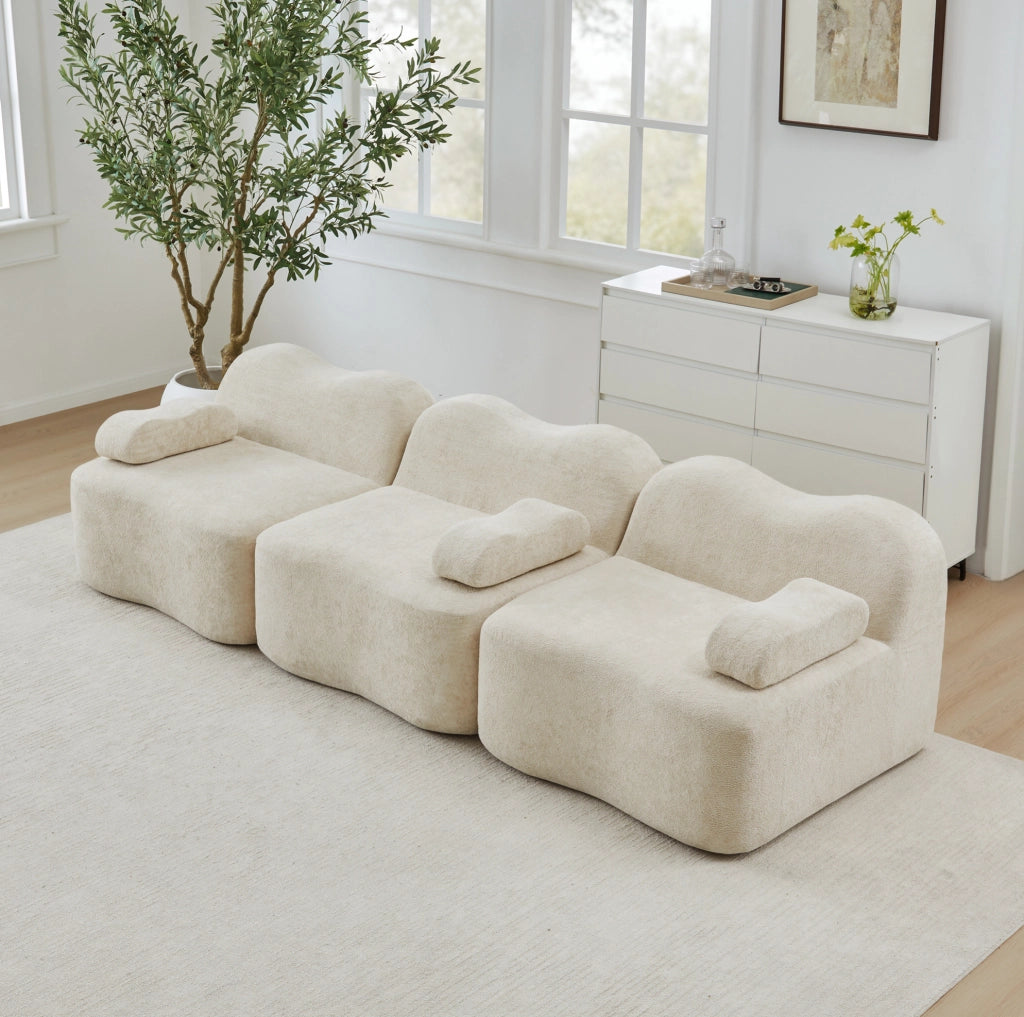 Divano modulare senza struttura in velluto beige, seduta profonda e schienali ergonomici