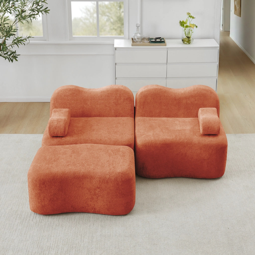 Divano modulare angolare 2 posti con pouf; forma ondulata e cuscino bracciolo mobile; velluto arancione