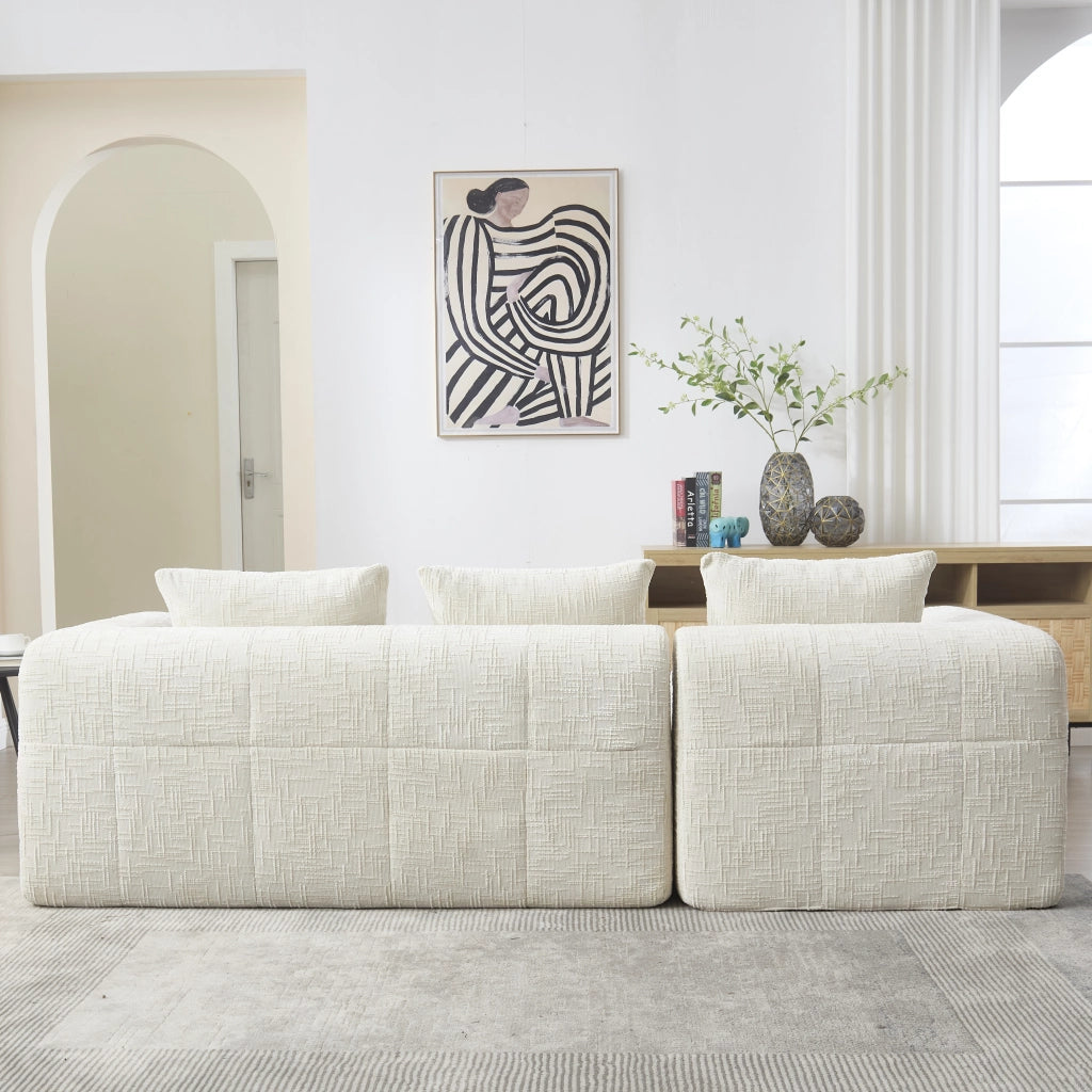 Divano modulare a L in chenille beige con chaise longue, 3 cuscini e tasche laterali