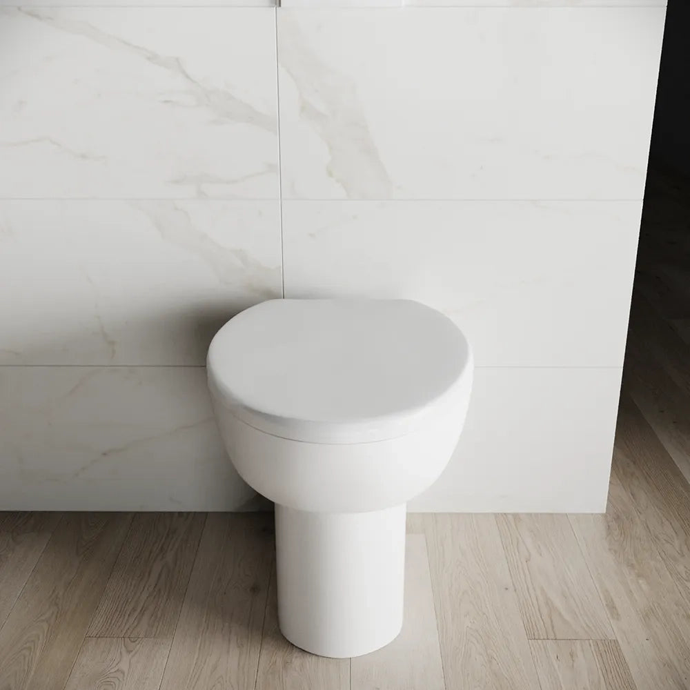Vaso WC filomuro in ceramica bianco lucido con sedile soft-close | Doha