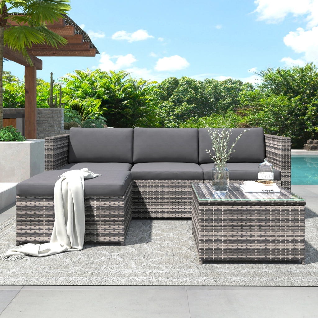 Set da giardino in polyrattan grigio con divano angolare pouf e tavolino in vetro temperato 196 × 136 × 67 cm