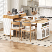 Isola cucina estensibile bianca e naturale con prese integrate