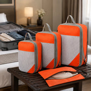 Set di 4 organizer da viaggio comprimibili arancioni