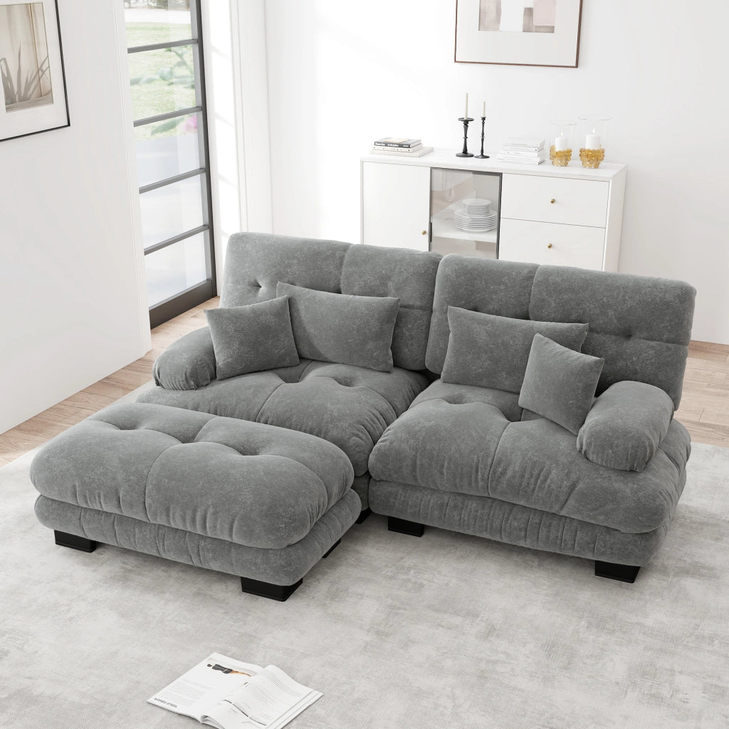 Divano modulare in chenille grigio con pouf mobili; seduta profonda e cuscini di supporto