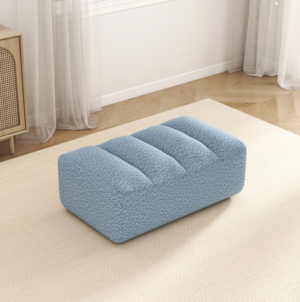 Divano modulare con ottomana in pile granulato blu