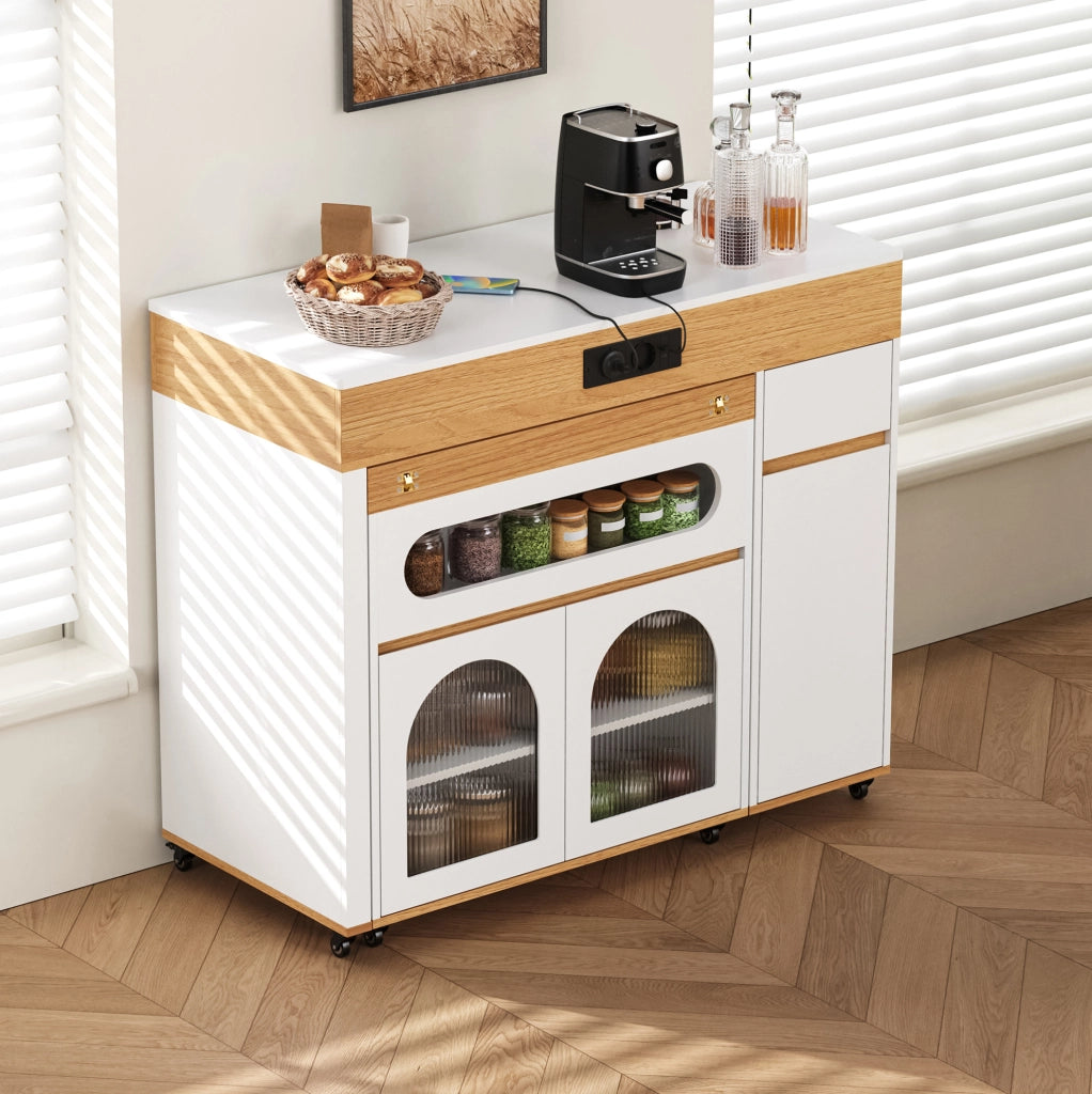 Isola cucina estensibile bianca e naturale con prese integrate