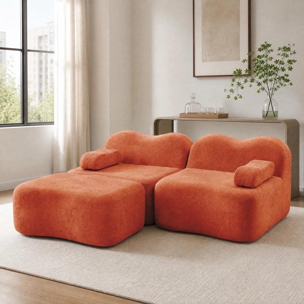 Divano modulare angolare 2 posti con pouf; forma ondulata e cuscino bracciolo mobile; velluto arancione