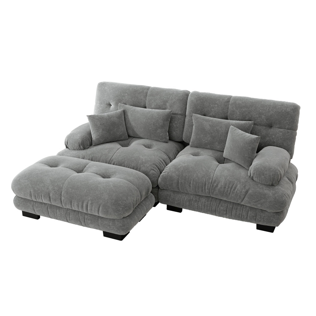 Divano modulare in chenille grigio con pouf mobili; seduta profonda e cuscini di supporto